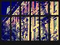 Window View - Building Facade with Fire Escapes and a Tank of Water on ...