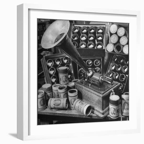 Phonograph Invented by Thomas A. Edison Sitting on Table with Boxes of Cylindrical Records-null-Framed Photographic Print