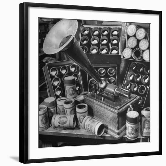 Phonograph Invented by Thomas A. Edison Sitting on Table with Boxes of Cylindrical Records-null-Framed Photographic Print