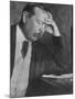 Photo by E. O. Hoppe of Author Sir Arthur Conan Doyle Seated, Eyes Downcast, in Reflective Pose-Emil Otto Hoppé-Mounted Premium Photographic Print