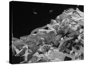 Photo of a Stack of Ticker Tape Covering as the Result of the Selling Climax at the Stock Exchange-Arthur Schatz-Stretched Canvas