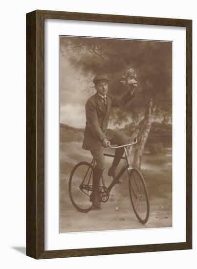 Photo of Man on Bicycle with Flowers-null-Framed Art Print