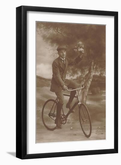 Photo of Man on Bicycle with Flowers-null-Framed Art Print