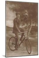 Photo of Man on Bicycle with Flowers-null-Mounted Art Print