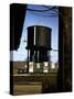 Photo Taken from Window of a Train Showing Water Storage Tower Beside Tracks-Walker Evans-Stretched Canvas