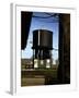 Photo Taken from Window of a Train Showing Water Storage Tower Beside Tracks-Walker Evans-Framed Photographic Print