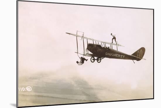 Photograph of a Wingwalkers on a Biplane-null-Mounted Giclee Print