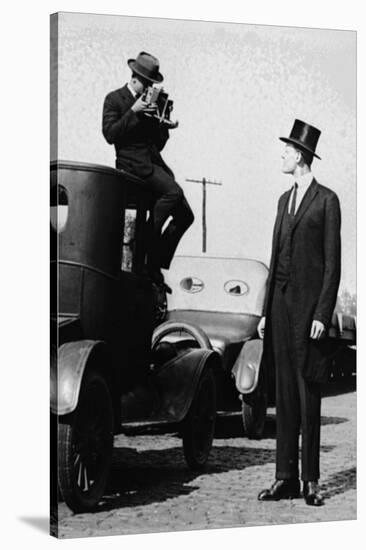 Photographer Mounts Himself on Roof of a Car to Shoot a Pictures of Exceedingly Tall Men in Top Hat-null-Stretched Canvas