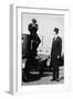 Photographer Mounts Himself on Roof of a Car to Shoot a Pictures of Exceedingly Tall Men in Top Hat-null-Framed Art Print