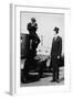 Photographer Mounts Himself on Roof of a Car to Shoot a Pictures of Exceedingly Tall Men in Top Hat-null-Framed Art Print