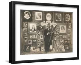 Photographer with his Work-null-Framed Art Print