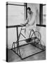 Physical Therapy Patient Using Stationary Bicycle, Ca. 1950-null-Stretched Canvas