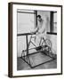 Physical Therapy Patient Using Stationary Bicycle, Ca. 1950-null-Framed Photo