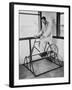 Physical Therapy Patient Using Stationary Bicycle, Ca. 1950-null-Framed Photo