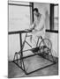 Physical Therapy Patient Using Stationary Bicycle, Ca. 1950-null-Mounted Photo