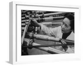 Physicist Dr. Chien-Shiung Wu Standing Amidst Tubes of Particle Accelerator at Columbia University-null-Framed Photographic Print