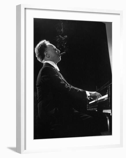 Pianist Arthur Rubenstein at the Piano, Smoking Cigar-Gjon Mili-Framed Premium Photographic Print