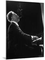 Pianist Arthur Rubenstein at the Piano, Smoking Cigar-Gjon Mili-Mounted Premium Photographic Print