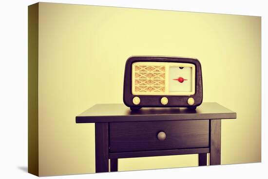 Picture of an Antique Radio Receptor on a Desk, with a Retro Effect-nito-Stretched Canvas