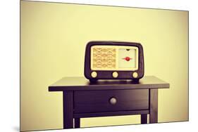 Picture of an Antique Radio Receptor on a Desk, with a Retro Effect-nito-Mounted Photographic Print