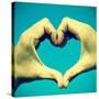 Picture Of Man Hands Forming A Heart Over The Blue Sky, With A Retro Effect-nito-Stretched Canvas