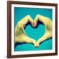 Picture Of Man Hands Forming A Heart Over The Blue Sky, With A Retro Effect-nito-Framed Art Print