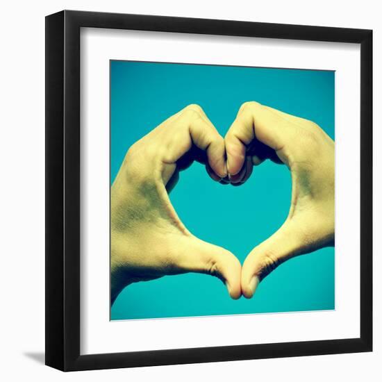 Picture Of Man Hands Forming A Heart Over The Blue Sky, With A Retro Effect-nito-Framed Art Print