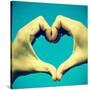 Picture Of Man Hands Forming A Heart Over The Blue Sky, With A Retro Effect-nito-Stretched Canvas