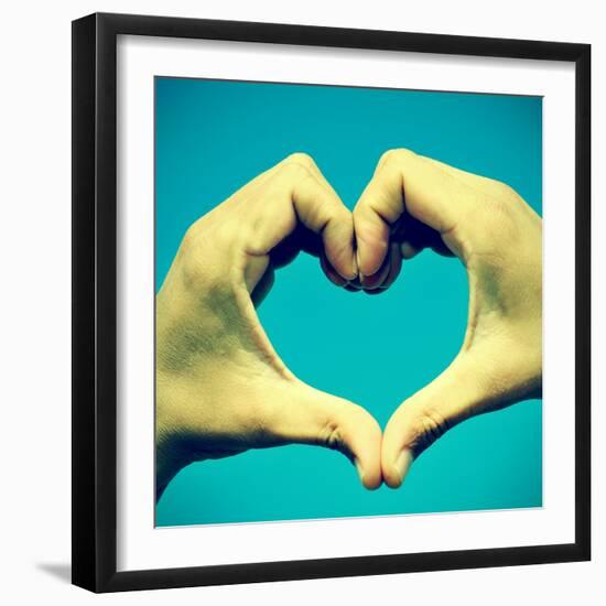 Picture Of Man Hands Forming A Heart Over The Blue Sky, With A Retro Effect-nito-Framed Art Print