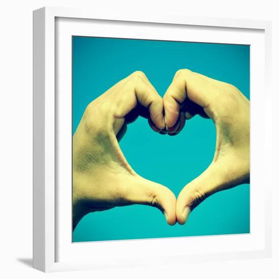 Picture Of Man Hands Forming A Heart Over The Blue Sky, With A Retro Effect-nito-Framed Art Print