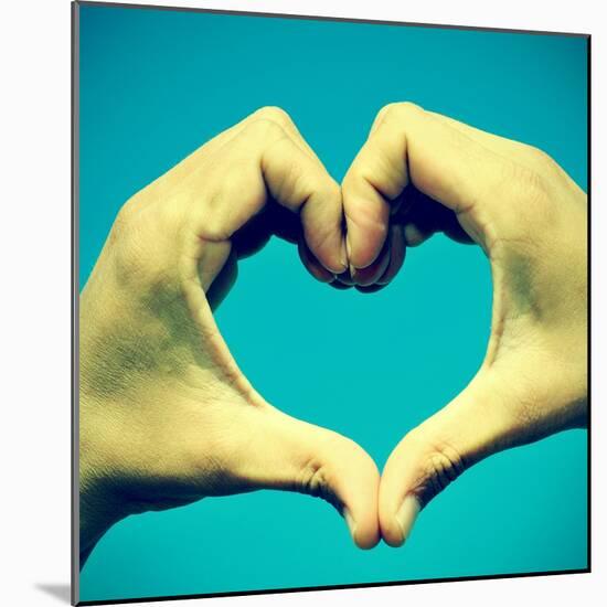Picture Of Man Hands Forming A Heart Over The Blue Sky, With A Retro Effect-nito-Mounted Art Print