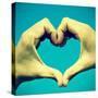 Picture Of Man Hands Forming A Heart Over The Blue Sky, With A Retro Effect-nito-Stretched Canvas