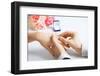 Picture of Man Putting Wedding Ring on Woman Hand-dolgachov-Framed Photographic Print