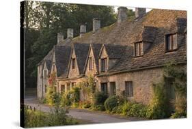 Picturesque Cottages at Arlington Row in the Cotswolds Village of Bibury, Gloucestershire, England-Adam Burton-Stretched Canvas