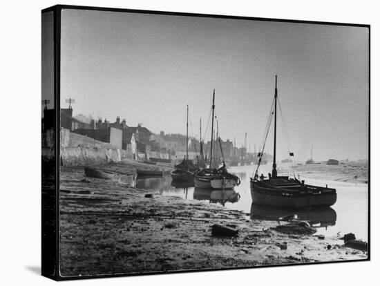 Picturesque Scene Showing Boats Reflected in the Water Next to the Mudflats of the Thames Estuary-null-Stretched Canvas