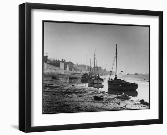 Picturesque Scene Showing Boats Reflected in the Water Next to the Mudflats of the Thames Estuary-null-Framed Art Print