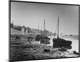 Picturesque Scene Showing Boats Reflected in the Water Next to the Mudflats of the Thames Estuary-null-Mounted Art Print