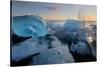 Pieces of glacial ice over black sand being washed by waves, Iceland-Raul Touzon-Stretched Canvas