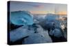 Pieces of glacial ice over black sand being washed by waves, Iceland-Raul Touzon-Stretched Canvas