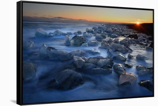 Pieces of glacial ice over black sand being washed by waves, Iceland-Raul Touzon-Framed Stretched Canvas