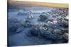 Pieces of glacial ice over black sand being washed by waves, Iceland-Raul Touzon-Stretched Canvas