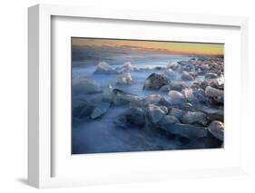 Pieces of glacial ice over black sand being washed by waves, Iceland-Raul Touzon-Framed Photographic Print