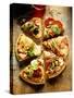 Pieces of Pizza with Different Toppings, on Wooden Background-null-Stretched Canvas