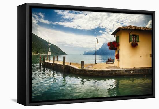 Pier and a Small House, Riva Del Garda, Italy-George Oze-Framed Stretched Canvas