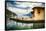 Pier and a Small House, Riva Del Garda, Italy-George Oze-Framed Stretched Canvas