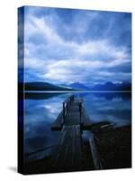 Pier at Lake McDonald Under Clouds-Aaron Horowitz-Stretched Canvas