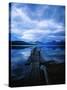 Pier at Lake McDonald Under Clouds-Aaron Horowitz-Stretched Canvas