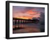 Pier at Sunrise with Reflections of Clouds on Beach, Tybee Island, Georgia, USA-Joanne Wells-Framed Photographic Print