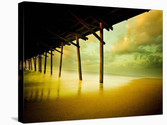 Pier over Calm Waters and Golden Sand-Jan Lakey-Stretched Canvas