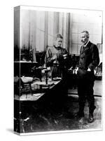 Pierre (1859-1906) and Marie Curie (1867-1934) in their Laboratory, c.1900-Valerian Gribayedoff-Stretched Canvas